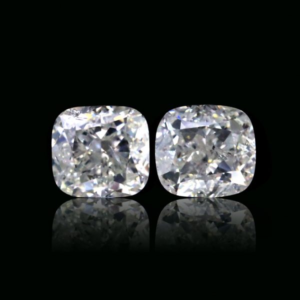 Matching pair Totalling 2.02 Ct. Natural F Color Cushion cut Diamonds