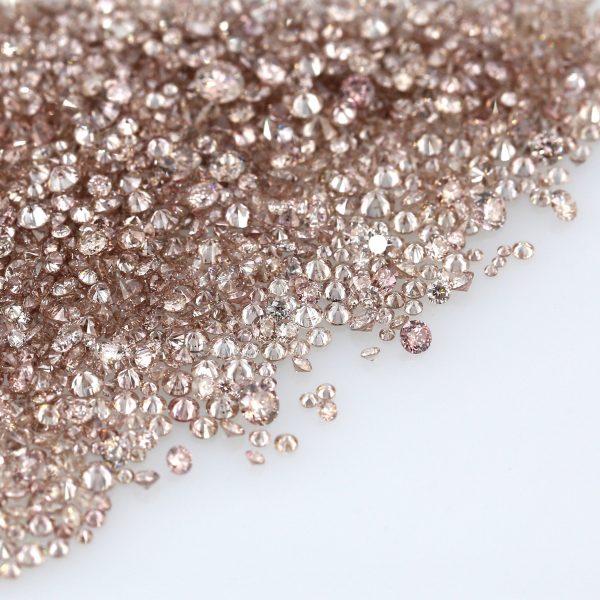 Natural Fancy Intense Orangy pinkish Brown 0.002 ct to 0.08 ct Round Brilliant cut Diamonds.